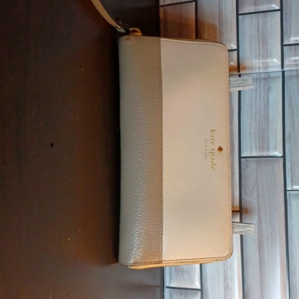 Kate Spade New York zip around wallet.